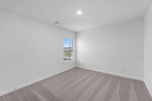 view of carpeted spare room