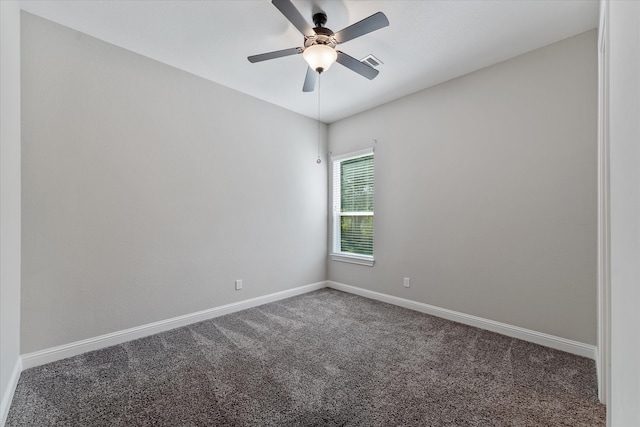 empty room with carpet floors and ceiling fan