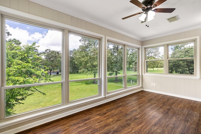 unfurnished sunroom with ceiling fan and visible vents