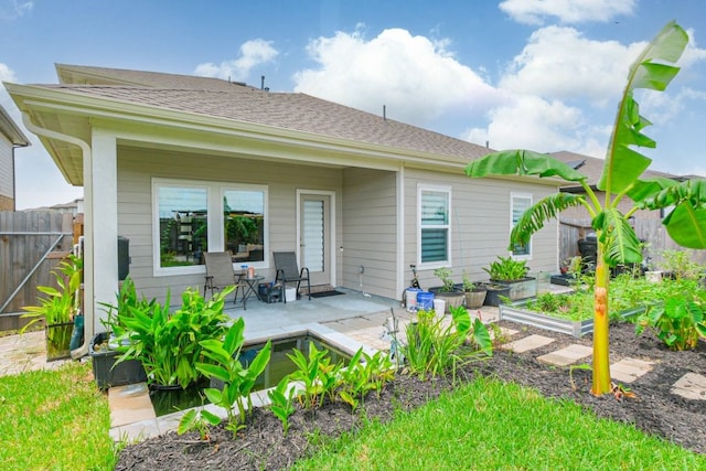 rear view of house with a patio area