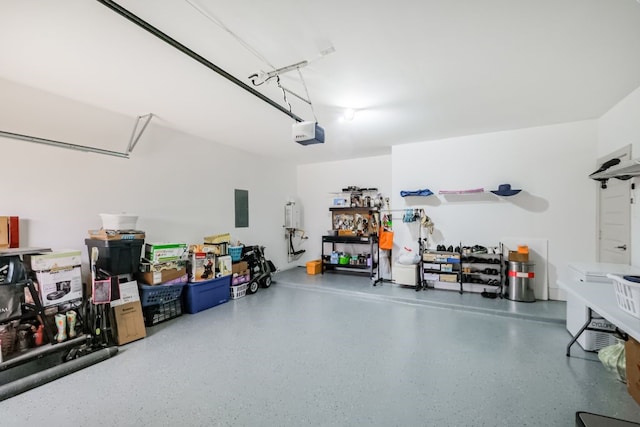 garage with electric panel and a garage door opener