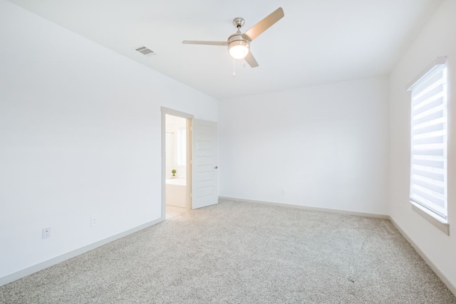 spare room featuring ceiling fan