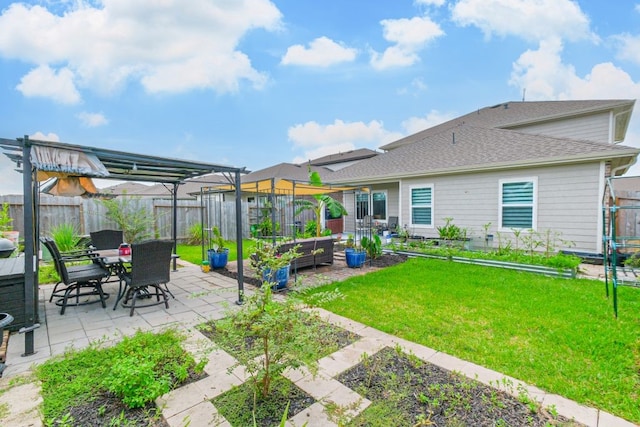 view of yard with a pergola and a patio