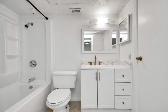 full bathroom featuring a textured ceiling, toilet, shower / bathtub combination, vanity, and tile patterned floors