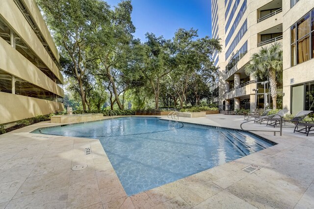 pool with a patio