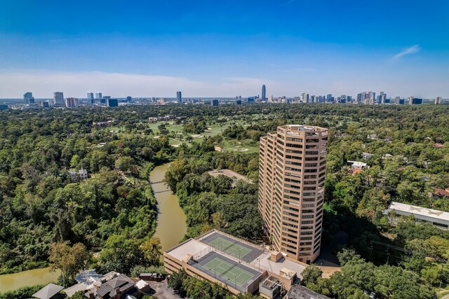 aerial view with a water view and a view of city