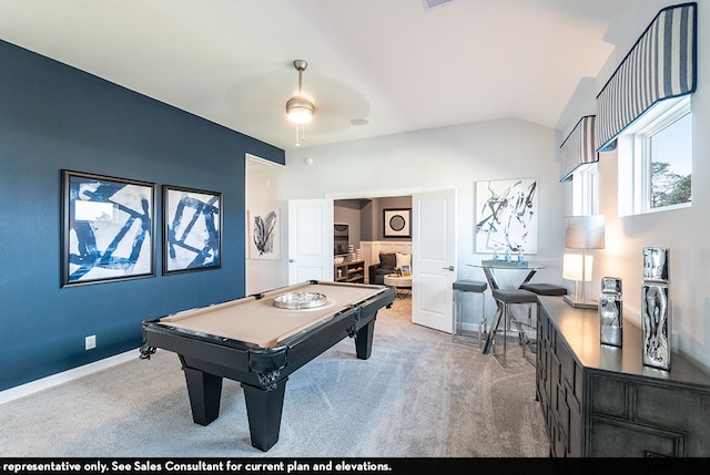 rec room with ceiling fan, light colored carpet, vaulted ceiling, and billiards