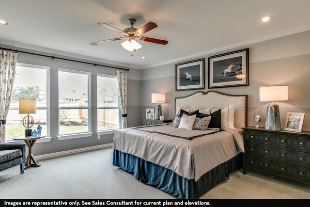 carpeted bedroom featuring ceiling fan and ornamental molding