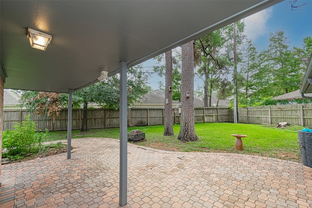 view of patio / terrace featuring a fire pit