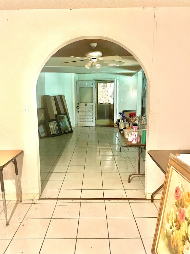 corridor with light tile patterned floors