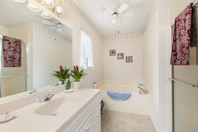 bathroom featuring independent shower and bath, vanity, ceiling fan, and tile patterned flooring