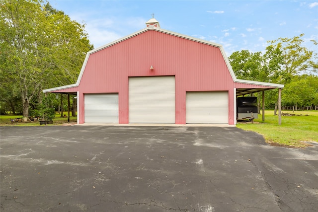 garage with a yard