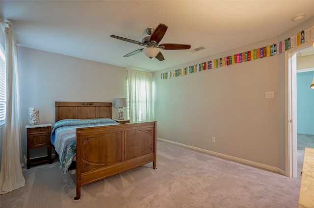 bedroom featuring ceiling fan and carpet flooring