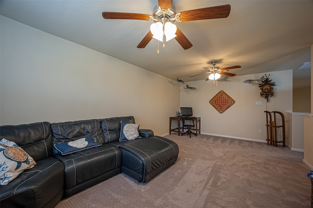 carpeted living room with ceiling fan