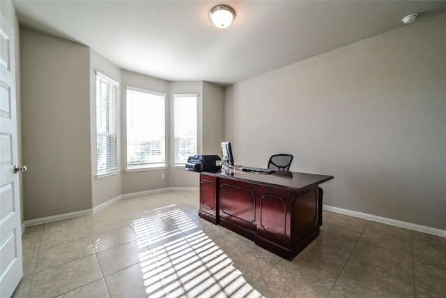 home office featuring light tile patterned flooring