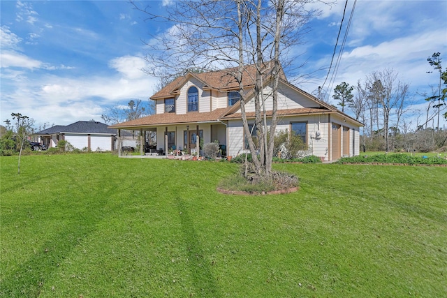 back of house with a lawn