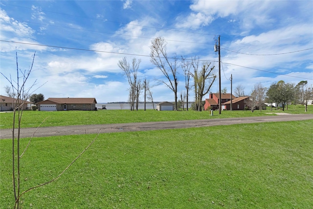 view of yard featuring a garage