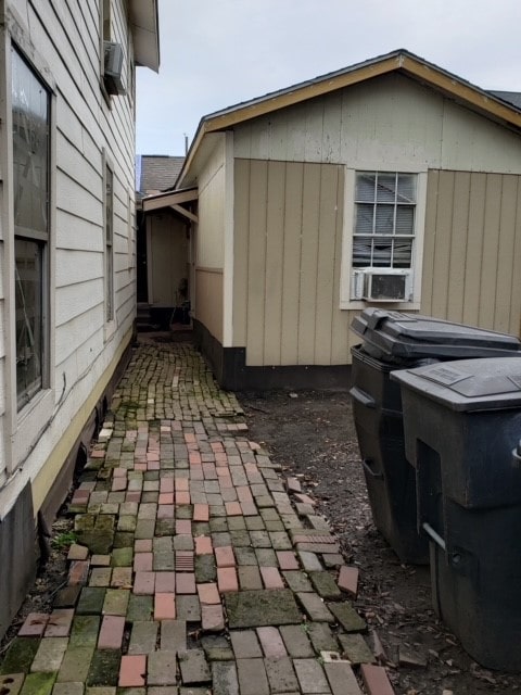 view of side of property featuring a patio