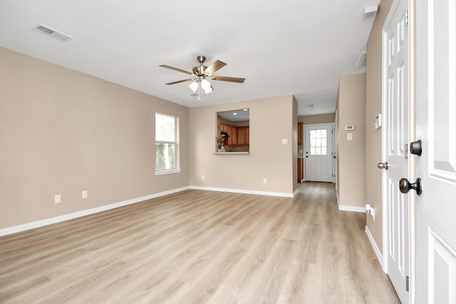 unfurnished living room with ceiling fan and light hardwood / wood-style floors