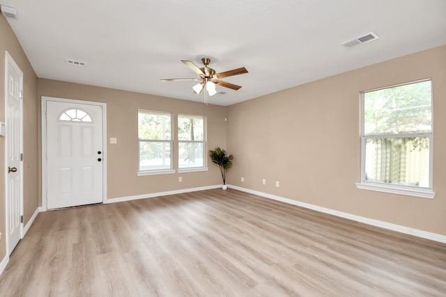 entryway with light wood-type flooring and ceiling fan