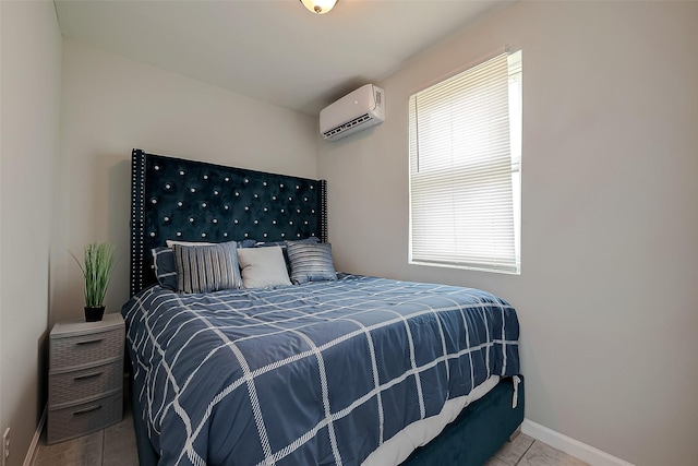 bedroom with a wall mounted air conditioner