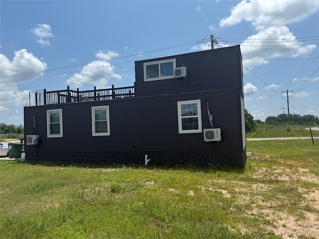 1585 Rd 5734, Cleveland, TX 77327 - view of side of property featuring a cooling unit and a yard