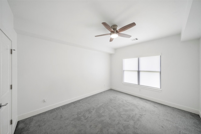 unfurnished room featuring carpet and ceiling fan