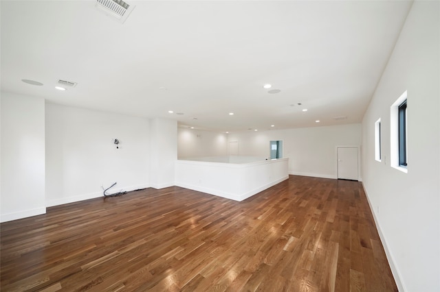 unfurnished living room with hardwood / wood-style floors