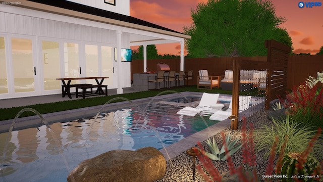 pool at dusk with pool water feature and a patio area