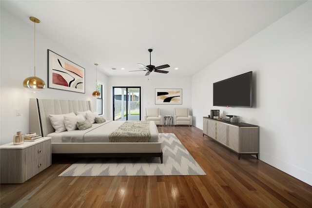 bedroom with dark wood-type flooring and ceiling fan