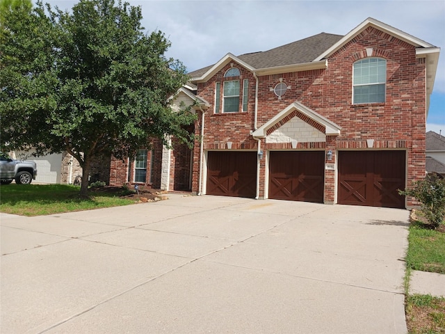 view of front of property with a garage