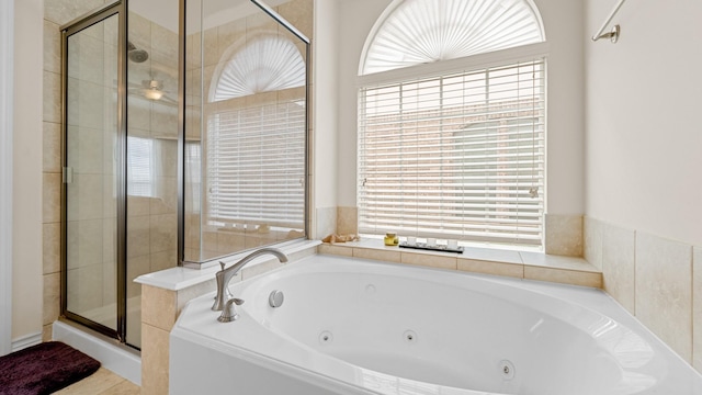 bathroom with independent shower and bath