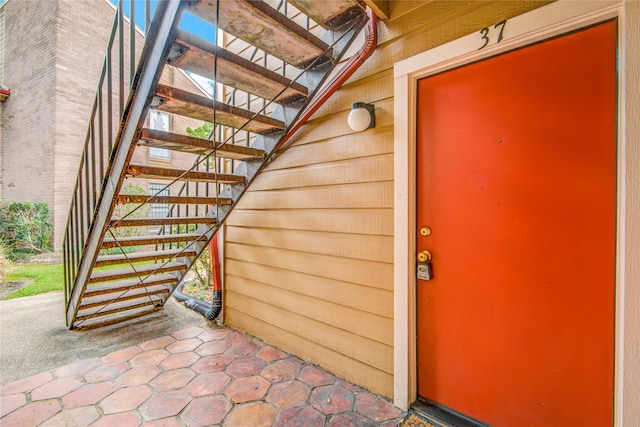 doorway to property with a patio area