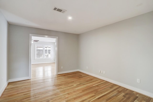 unfurnished room featuring light hardwood / wood-style floors