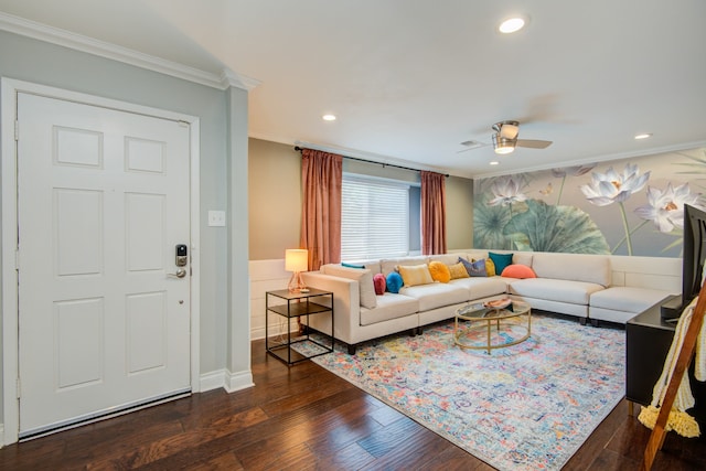 living room with ceiling fan, wood-type flooring, and ornamental molding