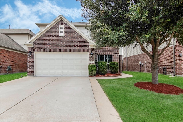 front facade with a garage and a front yard