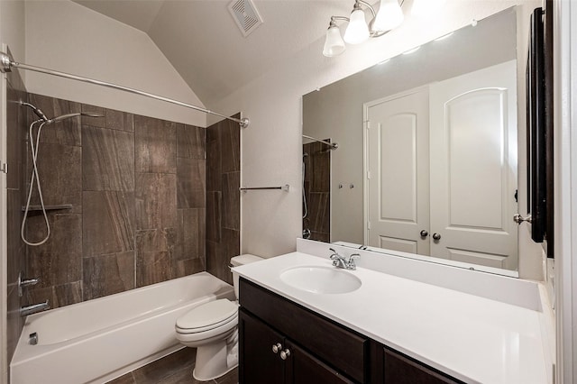 bathroom featuring visible vents, toilet, lofted ceiling, vanity, and  shower combination