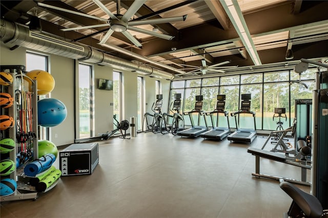 exercise room with ceiling fan