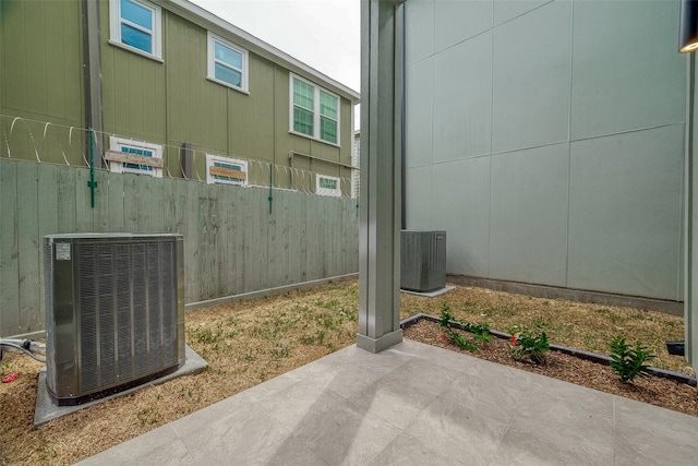 exterior space featuring a patio and central AC