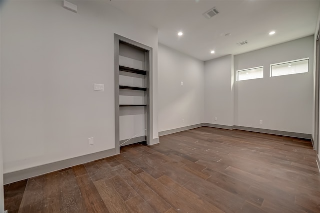 unfurnished room featuring wood-type flooring