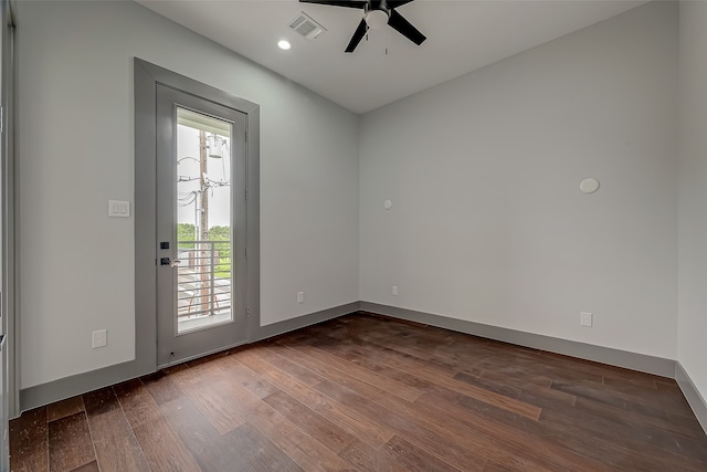 unfurnished room with hardwood / wood-style floors and ceiling fan