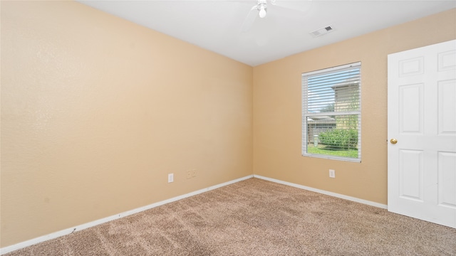 interior space with ceiling fan and carpet floors