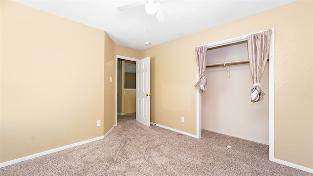 unfurnished bedroom with ceiling fan, a closet, and light colored carpet