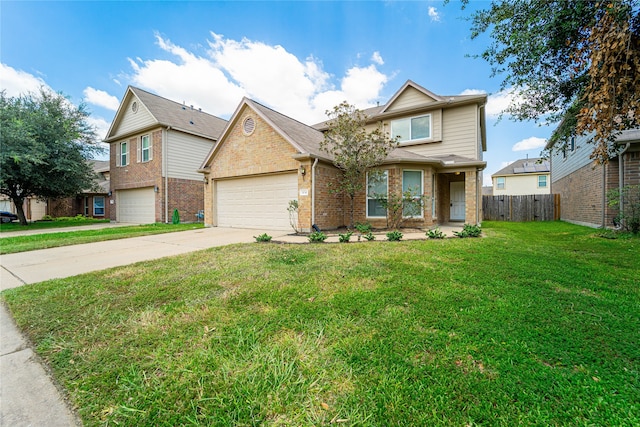 view of property with a garage and a front lawn