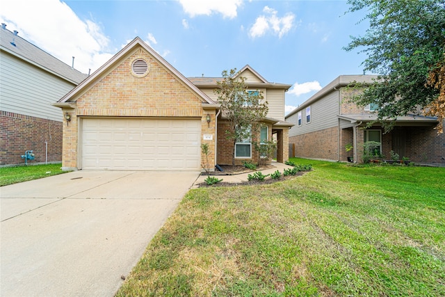 view of front of house featuring a garage and a front lawn