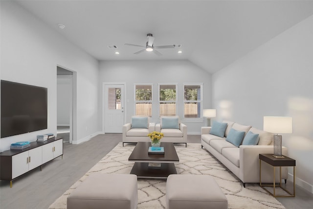 living room featuring ceiling fan, lofted ceiling, and light hardwood / wood-style flooring