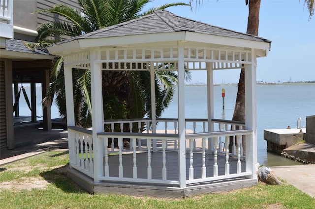 view of patio / terrace with a water view and a gazebo