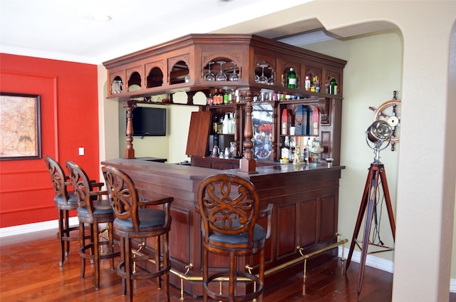 bar featuring wood-type flooring