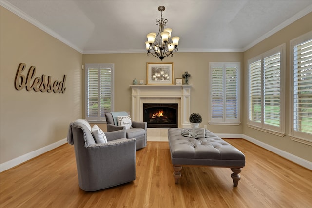 living room featuring wood-type flooring, a fireplace, and a wealth of natural light