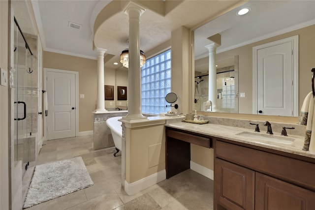 bathroom featuring independent shower and bath, decorative columns, and vanity